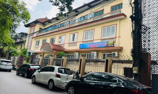 Trụ sở Nhà B101 Nguyễn Hiền của Trường ĐH Mở Hà Nội Ảnh: HOA BAN 