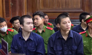 Các bị cáo tại phiên tòa ngày 22/7.