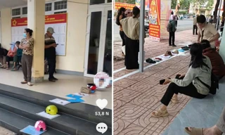 Người dân dùng mũ bảo hiểm, gạch đá 'đặt chỗ' nộp hồ sơ: Chủ tịch xã nói gì?