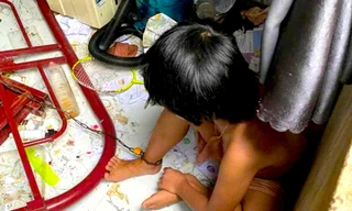 Vụ xích chân con gái 9 tuổi vào giường: Công an triệu tập người cha