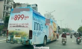 Xe khách biển số Bắc Ninh trùm kín biển quảng cáo 'diễu phố' ở Hà Nội