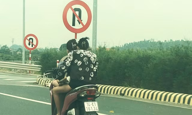 Hai cô gái đầu trần phi xe máy ‘bạt mạng’ trên cao tốc Hạ Long - Hải Phòng