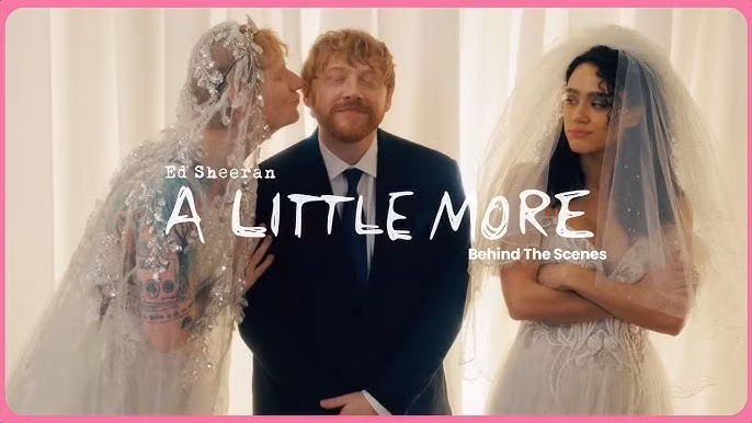 “Chú rể” Rupert Grint cùng “cô dâu” Ed Sheeran trong MV A Little More.