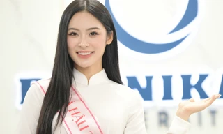 Á hậu Vân Nhi về trường