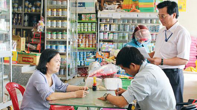 Hộ kinh doanh không muốn chuyển lên DN vì vướng nhiều thủ tục hành chính. Ảnh minh họa