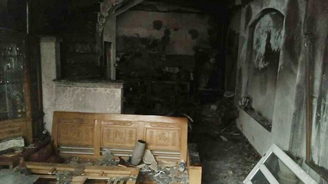 Bốn người trong một gia đình tử vong sau đám cháy. Ảnh: Phạm Dự.