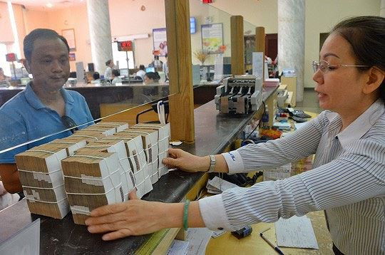 Theo Ngân hàng Nhà nước, mặt bằng lãi suất cho vay vẫn ổn định. Ảnh: NLĐ