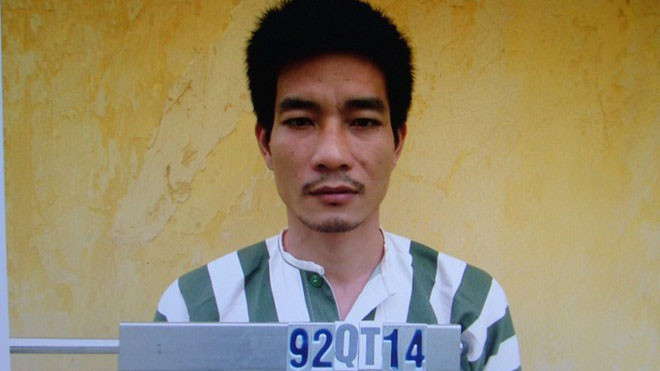 Nguyễn Mạnh Tuấn tại cơ quan công an.