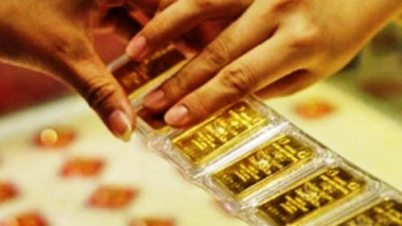 Vàng và USD cùng tăng