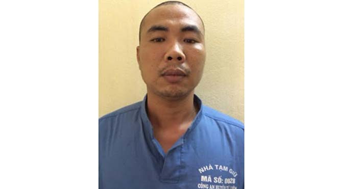 Hùng tại cơ quan công an.