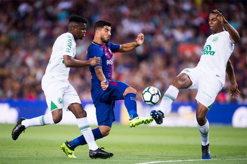 Luis Suarez góp một bàn vào chiến thắng của Barca. Ảnh: Reuters