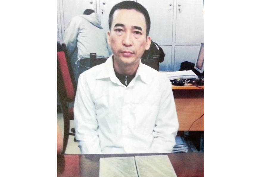 Dũng bị bắt khi đang ôm 2 bánh heroin.