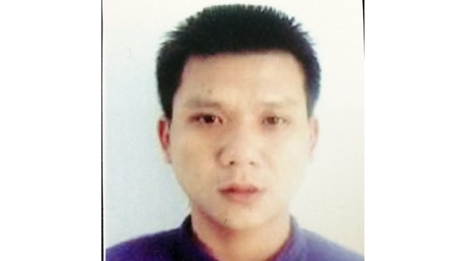 Đối tượng Lê Tấn Thọ tại cơ quan điều tra (ảnh do cơ quan điều tra cung cấp)