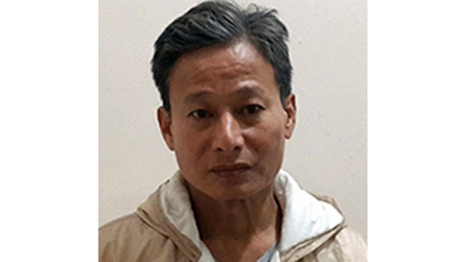 Bị can Trần Văn Toản. Ảnh: H.P.