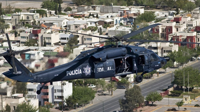 Trực thăng cảnh sát Mexico bị bắn hạ khi đấu súng với tội phạm. Ảnh minh họa: CNN.