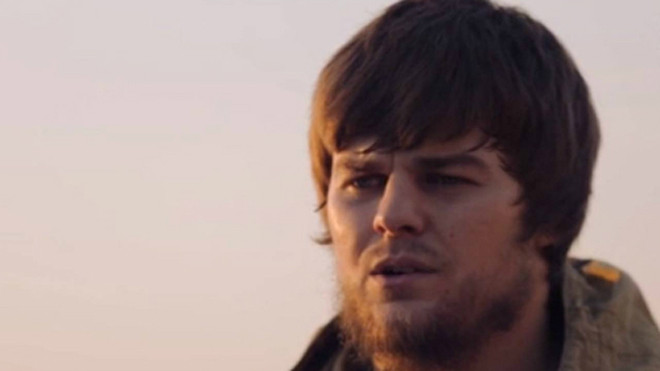 Hình ảnh tên đao phủ Anatoly Zemlyanka từ đoạn video hành quyết người đồng hương. Ảnh: WSJ