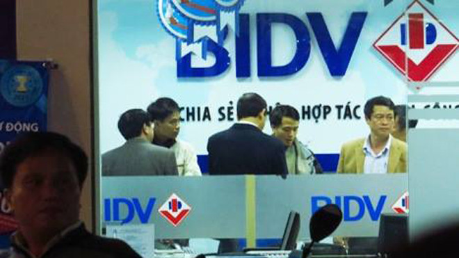 Tên cướp ngân hàng tại Huế đã lấy đi 725 triệu đồng. Ảnh: Vũ Thạnh.