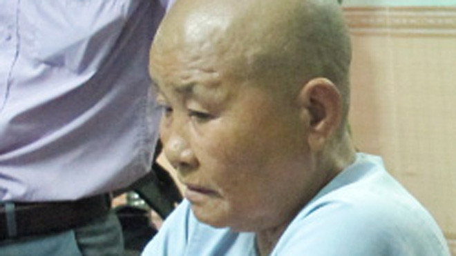 "Nhà sư" Trần Thị Tuyết Nhung tại cơ quan công an. Ảnh: N.Đ.