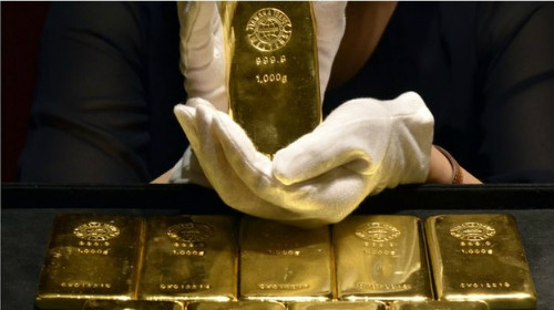 Giá vàng sụt giảm sáng nay do nhu cầu trú ẩn an toàn vào kim loại quý này mất dần vị thế. Ảnh: livetradingnews.com.