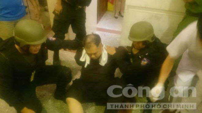 Đối tượng Eng Yong Kit bị đặc nhiệm khống chế - Ảnh: Thiên Long