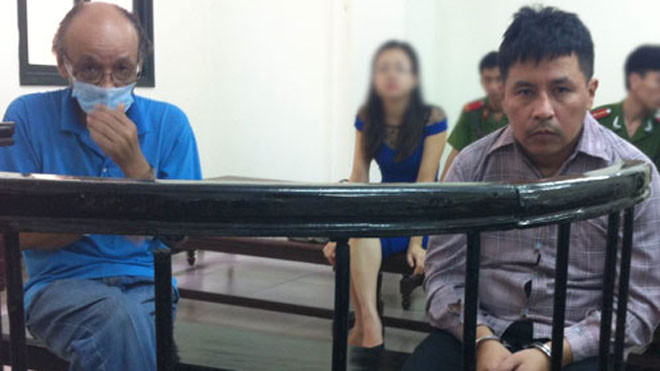 Hai bị cáo tại phiên toà sơ thẩm.