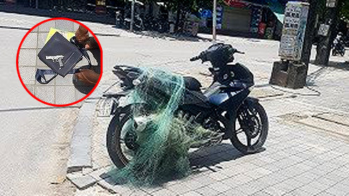 Lực lượng CSGT TP Thanh Hóa đã dùng súng bắn lưới để chặn xe vi phạm và khẩu súng thu được của người vi phạm