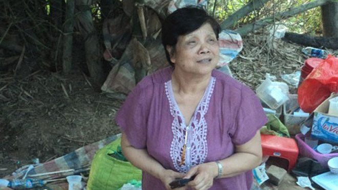 Bà Lương Thị Trang khi bị bắt giữ tại sới bạc Sóc Sơn. 