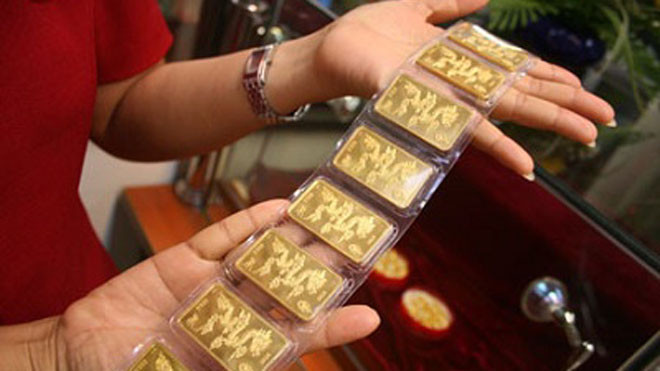 Giá vàng tăng nhẹ, USD ổn định