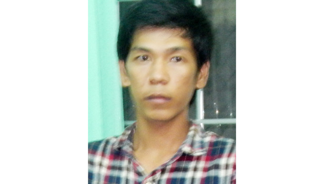 Sang bị bắt sau 3 tuần đâm người phụ nữ vỗ đầu mình. Ảnh: Yến Phương