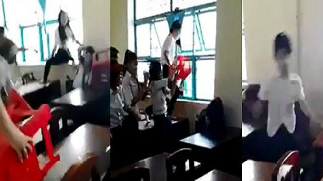 Nữ sinh Trà Vinh đánh nhau, khiến một nữ sinh bị u não, điếc 1 tai.(Ảnh cắt từ clip) 