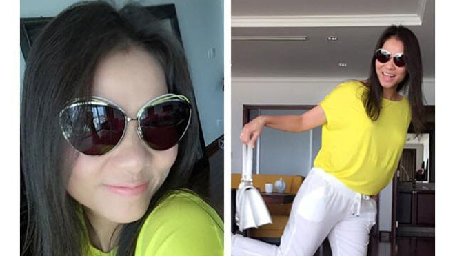 Thu Minh đi dép bệt ăn mặc thoải mái trước khi ra đường. 