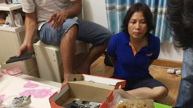 Phượng bị bắt cùng tang vật. Ảnh: Q.T