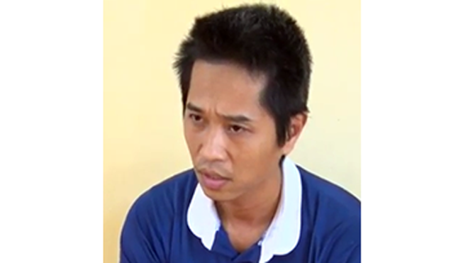 Kẻ lừa đảo bị bắt giữ. Ảnh: Bảo Quốc