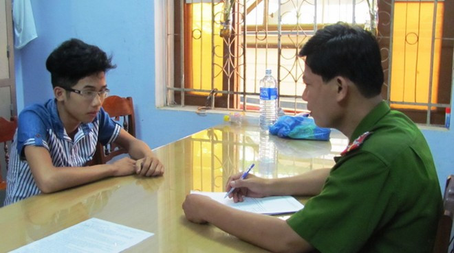 Lê Văn Quang tại cơ quan công an. 