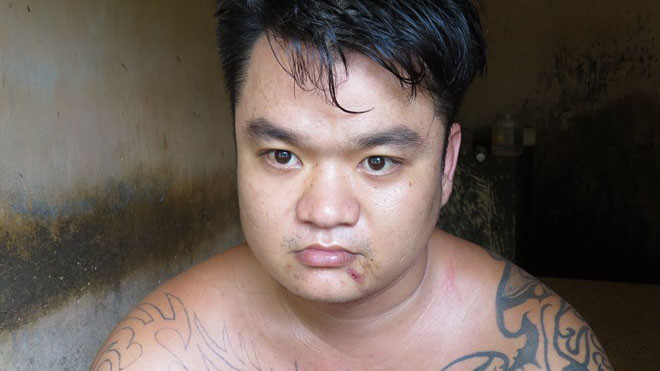 Thanh niên trộm chim bị bắt giữ.