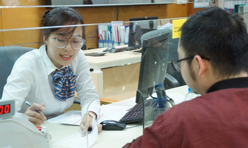 Các ngân hàng thương mại đã có thời gian và lộ trình để tăng vốn tự có, dịch chuyển tài sản để đáp ứng hai điều chỉnh kỹ thuật này - Ảnh: Quang Phúc.