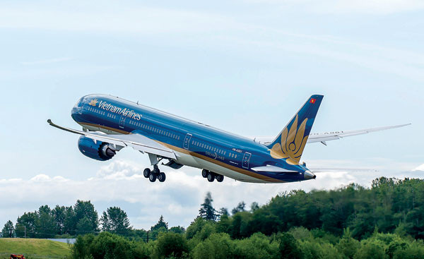 Vietnam Airlines là 1 trong 5 doanh nghiệp lớn sẽ được Bộ GTVT chuyển giao sớm về Ủy ban Quản lý vốn Nhà nước - Ảnh: Thanh Bình