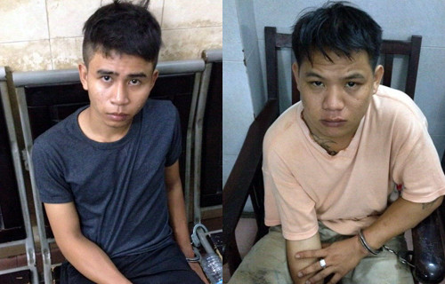 Hai kẻ cướp giật tại cơ quan điều tra. Ảnh: Quốc Thắng.