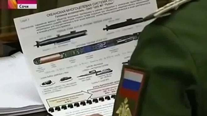 Tài liệu về hệ thống ngư lôi hạt nhân được máy quay ghi lại. Ảnh: Guardian