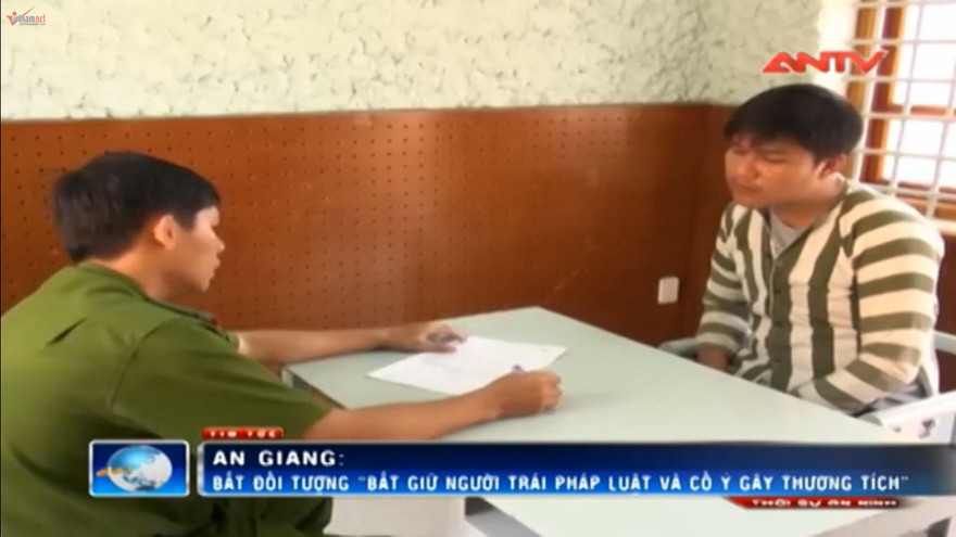 Huỳnh Thanh Quang tại cơ quan công an.