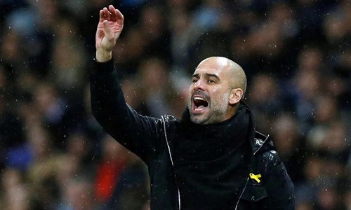 Guardiola cho rằng lịch thi đấu tại Anh đang hủy hoại cầu thủ. Ảnh: Reuters.