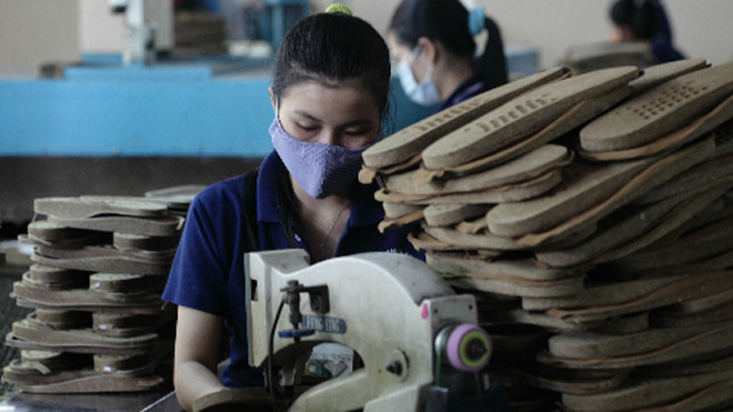 Dù môi trường kinh doanh được cải thiện nhưng vẫn còn những nút thắt thể chế cần tháo gỡ, tạo lực cho doanh nghiệp phát triển. Ảnh minh hoạ