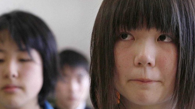 Một học sinh Nhật Bản trong lớp học ở thành phố Ofunato, tỉnh Iwate. Ảnh: Reuters