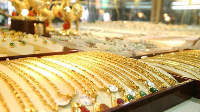 Theo các chuyên gia, giá vàng chịu áp lực giảm mạnh khi đồng USD tăng giá. Ảnh minh họa