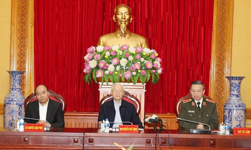 Tổng Bí thư, Chủ tịch nước Nguyễn Phú Trọng, Thủ tướng Chính phủ Nguyễn Xuân Phúc và Bộ trưởng Bộ Công an Tô Lâm dự Hội nghị. (Ảnh: Trí Dũng/TTXVN)