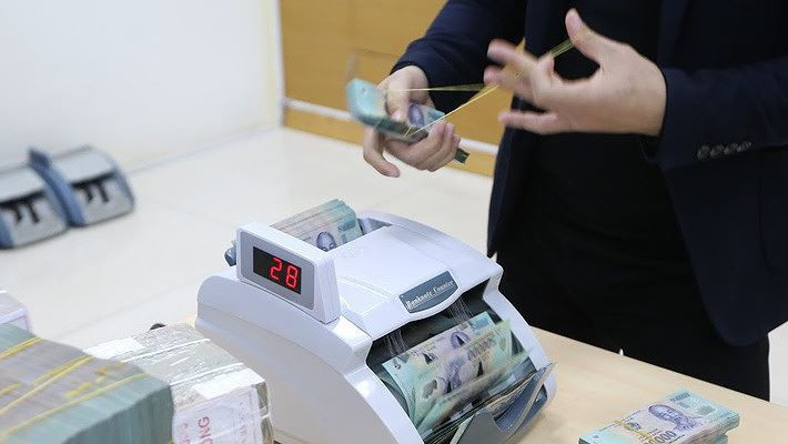 Trong ngày 12/11, Ngân hàng Nhà nước bơm ròng 4.000 tỷ đồng ra thị trường, đưa khối lượng lưu hành trên kênh cầm cố tăng lên mức 56.658 tỷ đồng - Ảnh: Quang Phúc.