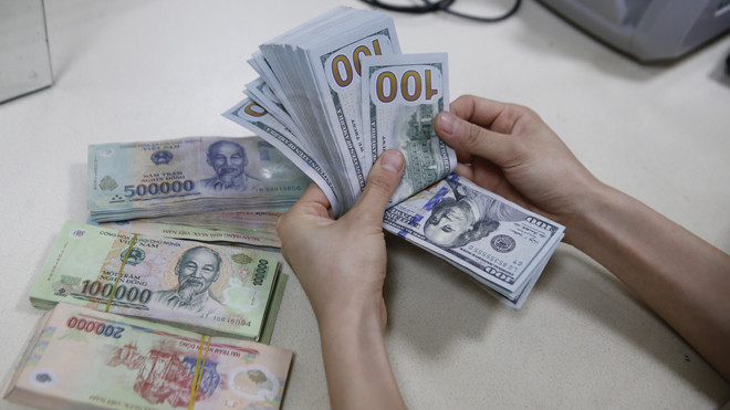 Tỷ giá VND/USD bất ngờ tăng 1%