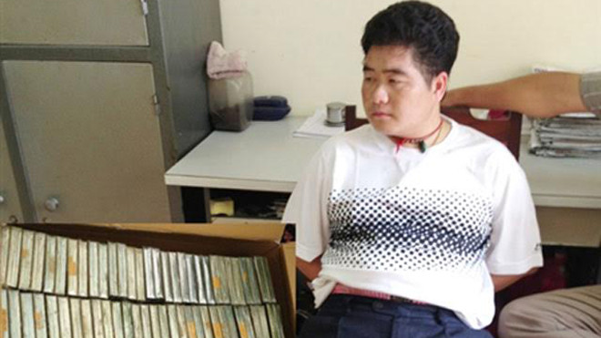 Trùm ma túy Tàng "Keangnam" và tang vật.