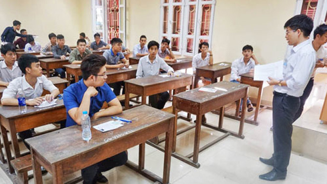 Thí sinh chuẩn bị làm bài thi trong kỳ thi THPT quốc gia. Ảnh: Giang Huy.