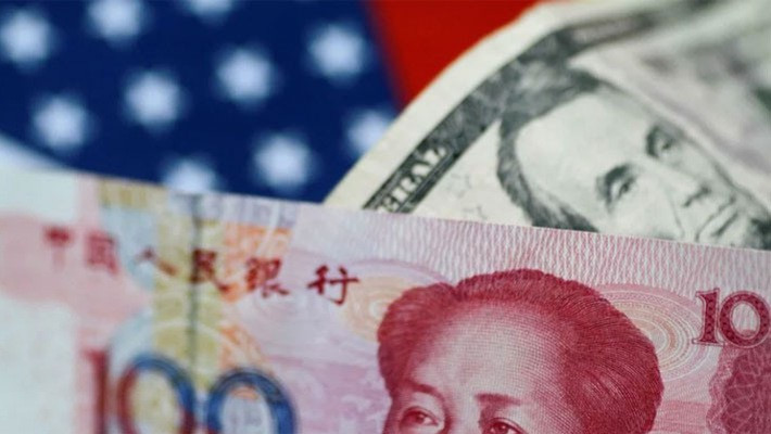 Nhân dân tệ đã để mất hết thành quả tăng giá từ đầu năm so với USD - Ảnh: Reuters/SCMP.